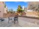 Private backyard features brick pavers and mature landscaping at 5382 Runningbrook Rd, Las Vegas, NV 89120