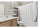 Bathroom features vanity and shower with curtain at 5382 Runningbrook Rd, Las Vegas, NV 89120