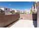 Private backyard with block wall, concrete patio, and low maintenance landscaping at 5461 Dungaree St, Las Vegas, NV 89118