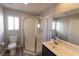 Bathroom featuring glass enclosed shower, toilet and single vanity at 5461 Dungaree St, Las Vegas, NV 89118