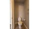 Powder room features a toilet, towel rack, and neutral paint at 5461 Dungaree St, Las Vegas, NV 89118