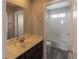 Bathroom with large vanity, mirror, and shower/tub combo at 5461 Dungaree St, Las Vegas, NV 89118