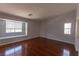 Spacious bedroom with hardwood floors, natural light and bright neutral paint at 5461 Dungaree St, Las Vegas, NV 89118