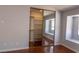 Bedroom with mirrored closet door and organized closet shelves at 5461 Dungaree St, Las Vegas, NV 89118