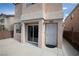 Inviting entrance showcasing a sliding glass door and secure door to the home at 5461 Dungaree St, Las Vegas, NV 89118