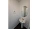 A bathroom that features a pedestal sink, an oval mirror and a wall mounted towel holder at 5661 Bonds Flat St, Las Vegas, NV 89148