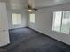 Large bedroom with neutral carpet, ceiling fan and good natural light at 5661 Bonds Flat St, Las Vegas, NV 89148