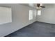 Spacious bedroom with neutral carpet, ceiling fan and good natural light at 5661 Bonds Flat St, Las Vegas, NV 89148