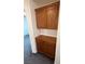 Hallway built-ins featuring dark wood and tons of storage at 5661 Bonds Flat St, Las Vegas, NV 89148