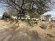 Scenic walking path through a well-kept community green space, promoting an active lifestyle at 5661 Bonds Flat St, Las Vegas, NV 89148