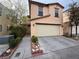 Charming two-story home featuring a two-car garage and well-maintained landscaping at 5661 Bonds Flat St, Las Vegas, NV 89148