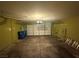 A spacious garage featuring ample room for parking and storage with overhead lighting at 5661 Bonds Flat St, Las Vegas, NV 89148