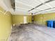 Spacious garage features an overhead door and water heater, ready for parking and storage at 5661 Bonds Flat St, Las Vegas, NV 89148