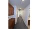 Upstairs hallway shows built in cabinets and gray carpeting at 5661 Bonds Flat St, Las Vegas, NV 89148
