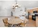 Open kitchen flows into a comfortable dining area, perfect for casual meals at 5912 Cuddles Ct, North Las Vegas, NV 89081