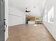 Open-concept living space features neutral paint, tile flooring and lots of natural light at 5912 Cuddles Ct, North Las Vegas, NV 89081