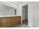 Bathroom with double sink and storage closet at 6382 Lonesome Lake St, Las Vegas, NV 89148