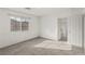Well lit bedroom with view of bathroom, neutral walls and carpeted floor at 6382 Lonesome Lake St, Las Vegas, NV 89148