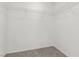 Walk-in closet with wire shelving and neutral carpeting, ready for organization at 6382 Lonesome Lake St, Las Vegas, NV 89148