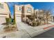 Attractive two-story home featuring a quaint facade and tidy landscaping at 6382 Lonesome Lake St, Las Vegas, NV 89148
