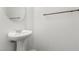 Half bath with white pedestal sink at 6382 Lonesome Lake St, Las Vegas, NV 89148