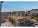 Evening view of pool and townhomes from private balcony at 6447 Wide Sky St, Las Vegas, NV 89166
