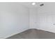 Bedroom features neutral carpet, a ceiling fan, a closet, and a white door at 6447 Wide Sky St, Las Vegas, NV 89166