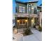 Charming, multi-level home features stone accents, private balcony, and cozy front porch at 6447 Wide Sky St, Las Vegas, NV 89166