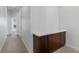 Hallway with built-in cabinets and a white countertop at 6447 Wide Sky St, Las Vegas, NV 89166