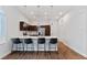 Well-designed kitchen featuring sleek countertops, stainless steel appliances, and contemporary pendant lights at 6447 Wide Sky St, Las Vegas, NV 89166