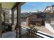 Private patio area featuring stone accents and views of the community pool and surrounding buildings at 6447 Wide Sky St, Las Vegas, NV 89166