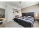 Comfortable bedroom featuring two beds, a desk, and access to other living spaces at 6923 Emerald Springs Ln, Las Vegas, NV 89113