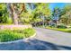Welcoming 'The Springs' community entrance with beautiful landscaping and a tranquil ambiance at 6923 Emerald Springs Ln, Las Vegas, NV 89113