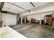 Bright and spacious three-car garage with room for vehicles and storage at 6923 Emerald Springs Ln, Las Vegas, NV 89113