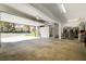 Large three-car garage offers room for vehicles, storage, washer, and dryer at 6923 Emerald Springs Ln, Las Vegas, NV 89113