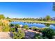 Enjoy lush green golf course views from this scenic property, bordering a peaceful pond at 6923 Emerald Springs Ln, Las Vegas, NV 89113