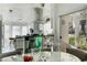 Modern kitchen featuring stainless steel appliances and an island with breakfast bar at 6923 Emerald Springs Ln, Las Vegas, NV 89113