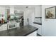 Modern kitchen featuring stainless steel appliances, an island with breakfast bar at 6923 Emerald Springs Ln, Las Vegas, NV 89113