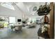 Bright and airy open-concept living room boasts a fireplace, skylights, and easy outdoor access at 6923 Emerald Springs Ln, Las Vegas, NV 89113
