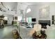 Bright, open living area with high ceilings, clerestory windows, and fireplace at 6923 Emerald Springs Ln, Las Vegas, NV 89113