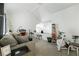 Cozy loft area with neutral decor, exercise equipment, and natural light, creating a versatile space at 6923 Emerald Springs Ln, Las Vegas, NV 89113