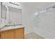 Bright bathroom featuring a vanity with storage and a shower-tub combo at 7200 Mineral Park Ave, Las Vegas, NV 89179