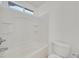Clean bathroom featuring a modern toilet and a shower-tub combo at 7200 Mineral Park Ave, Las Vegas, NV 89179