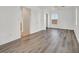 Bedroom features hardwood flooring and a ceiling fan at 7200 Mineral Park Ave, Las Vegas, NV 89179