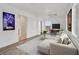 Inviting living room with modern decor, ceiling fan and ample natural light at 7200 Mineral Park Ave, Las Vegas, NV 89179