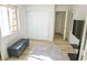 Bright bedroom with a closet and a view of an adjacent room at 7405 Painted Ridge St, Las Vegas, NV 89131