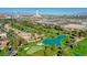 Aerial view of the community showcasing a golf course, lush greenery, and city skyline at 746 Oakmont Ave # 708, Las Vegas, NV 89109