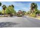 Community entrance to Las Vegas Country Club Estates with lush landscaping at 746 Oakmont Ave # 708, Las Vegas, NV 89109
