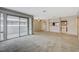 Bright living room with sliding glass doors to a balcony and an open view into the kitchen at 746 Oakmont Ave # 708, Las Vegas, NV 89109