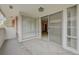Large enclosed patio with great natural light, multiple sliding glass doors, and carpeted flooring at 746 Oakmont Ave # 708, Las Vegas, NV 89109